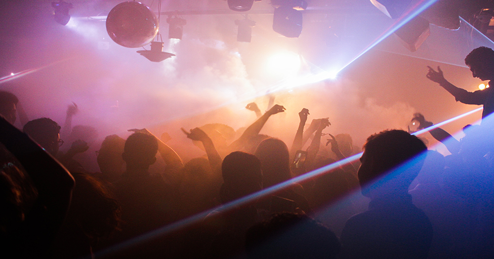 People dancing in a busy nightclub