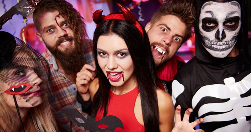 Group of people dressed up as skeletons and vampires for some great Halloween parties