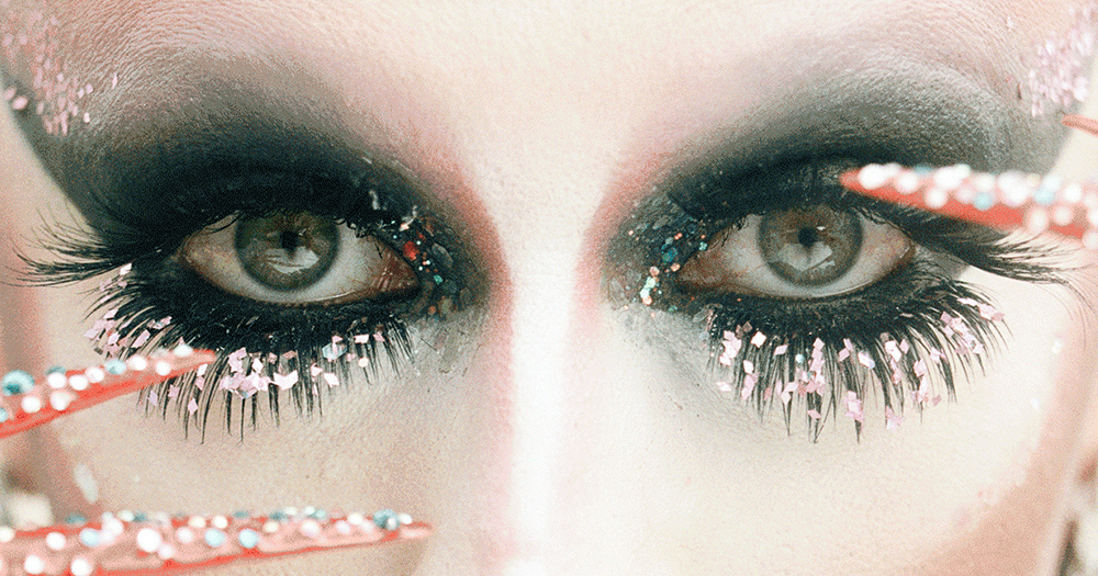 The heavily made up eyes of a drag queen