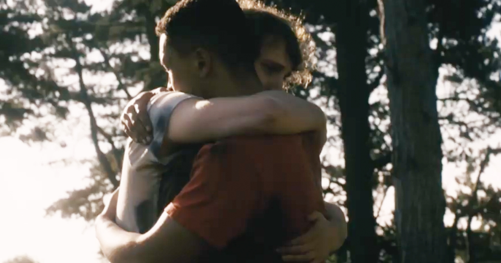 A screen grab from Brothers featuring two men hugging in a park