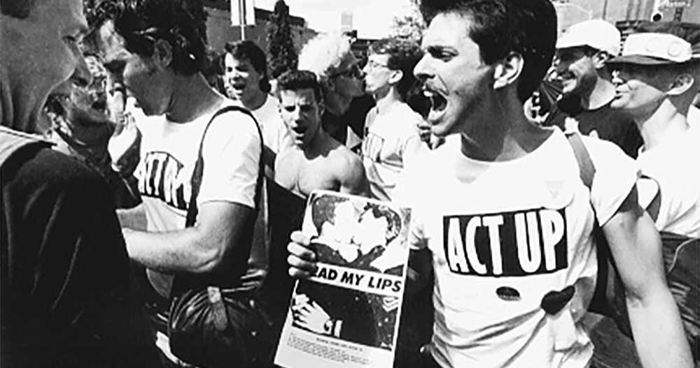 Men wearing Act Up t-shirts at an HIV/AIDS demonsration