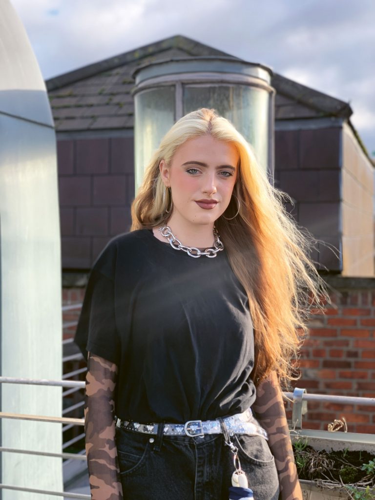 Rebecca Kelly author of "Who are we coming out for?"