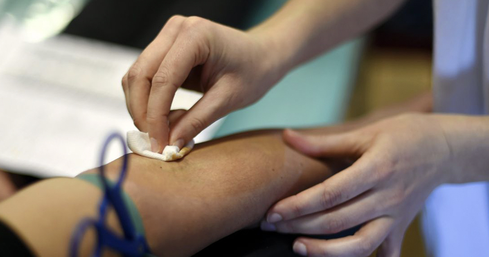Nurse swabbing a person's arm to prepare for a blood donation, the new laws for MSM have been changed by the Irish Blood Transfusion Service without an advisory group.