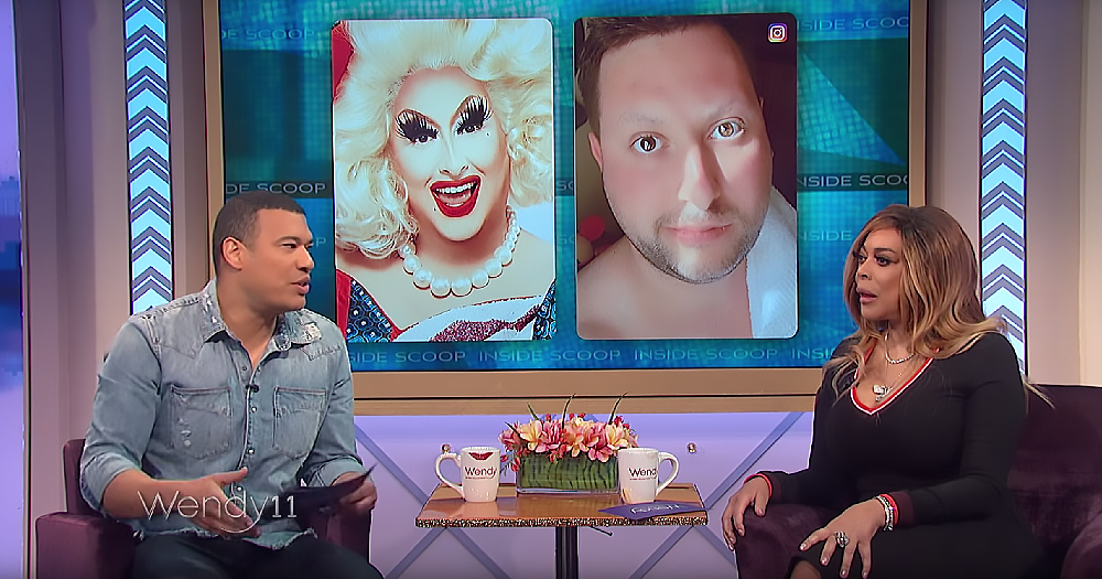 Panelists on a talk show with a screen in the background showing a drag queen in and out of makeup