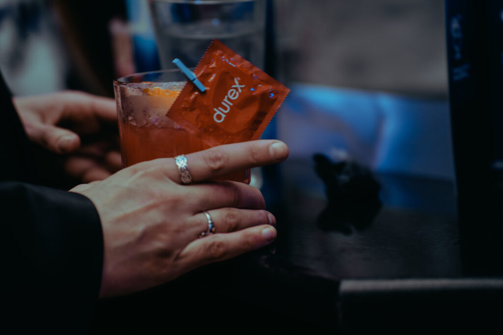 Condom on a cocktail at Durex campaign launch.
