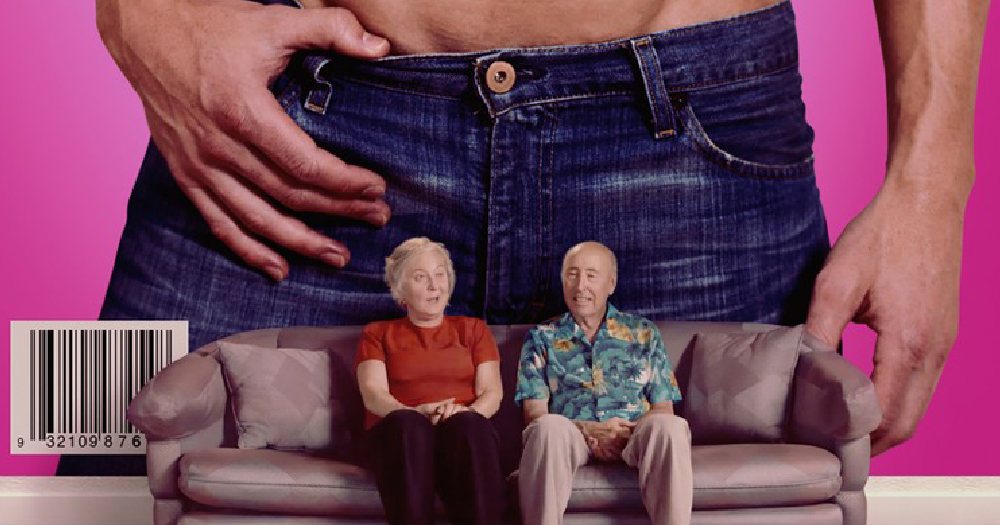 Poster for Circus of Books : An old woman and man sit on a couch, a huge image of a man's crotch in jeans on the wall behind them