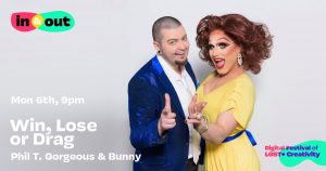 A drag king and a drag queen smiling and pointing at the camera