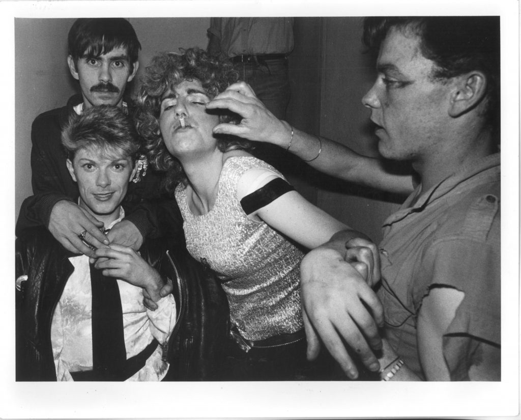 Vintage B&W photo of LGBT+ people partying at Flikkers