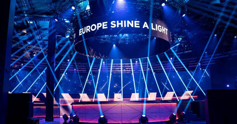 The empty Eurovision studio set featuring beams of light surrounding a globe