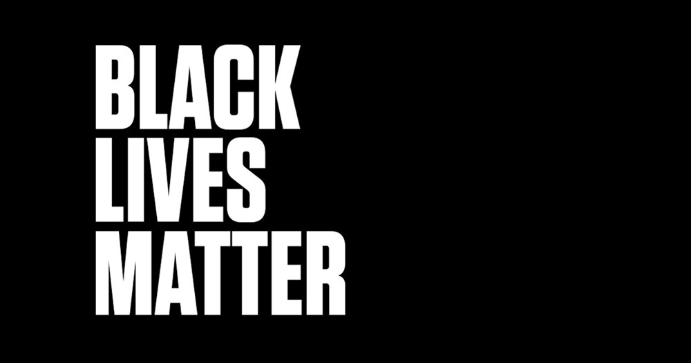The words Black Lives Matter against a dark background