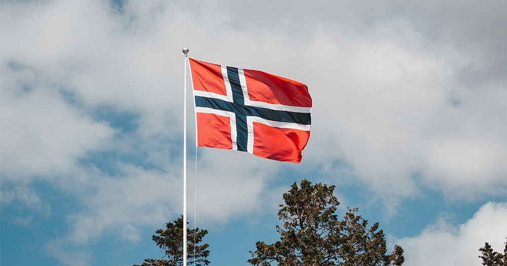 The flag of Norway against the sky