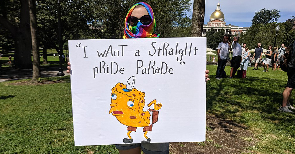 A protester of the Straight Pride Parade in Boston carries a sign reading "I wAnT a StRaIgHt pRiDe PaRaDe"