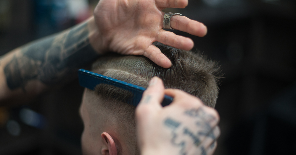A man having his hair cut