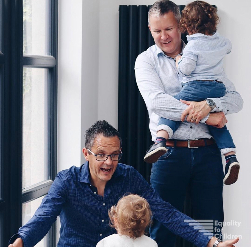 Two fathers and their children