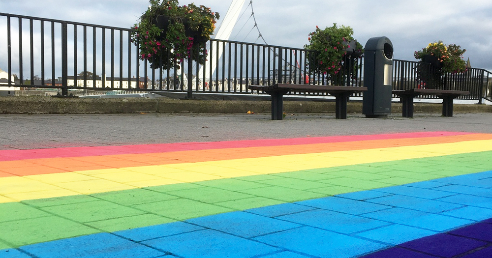 rainbow path painted on the pavement in Derry