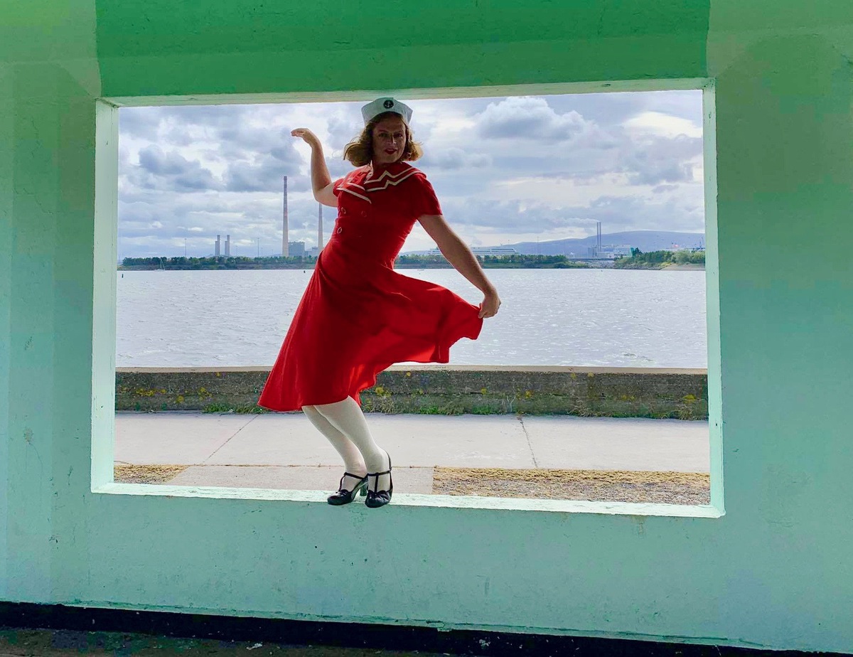 A lady swinging her skirt by the sea side, a piece from the mash mash exhibition, queer happenings this week
