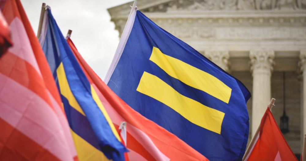equality and pride flags outside courthouse, Nevada and Arizona fight for LGBTQ+ rights during election.
