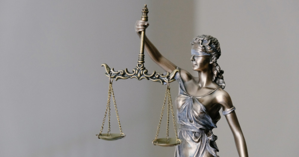 lady justice holding the scales, overturn ban on conversion therapy
