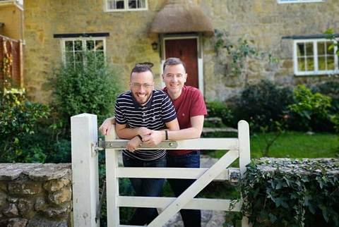 Sustainable Stocking fillers : Image of James and Eoin from Faerly leaning on a white gate