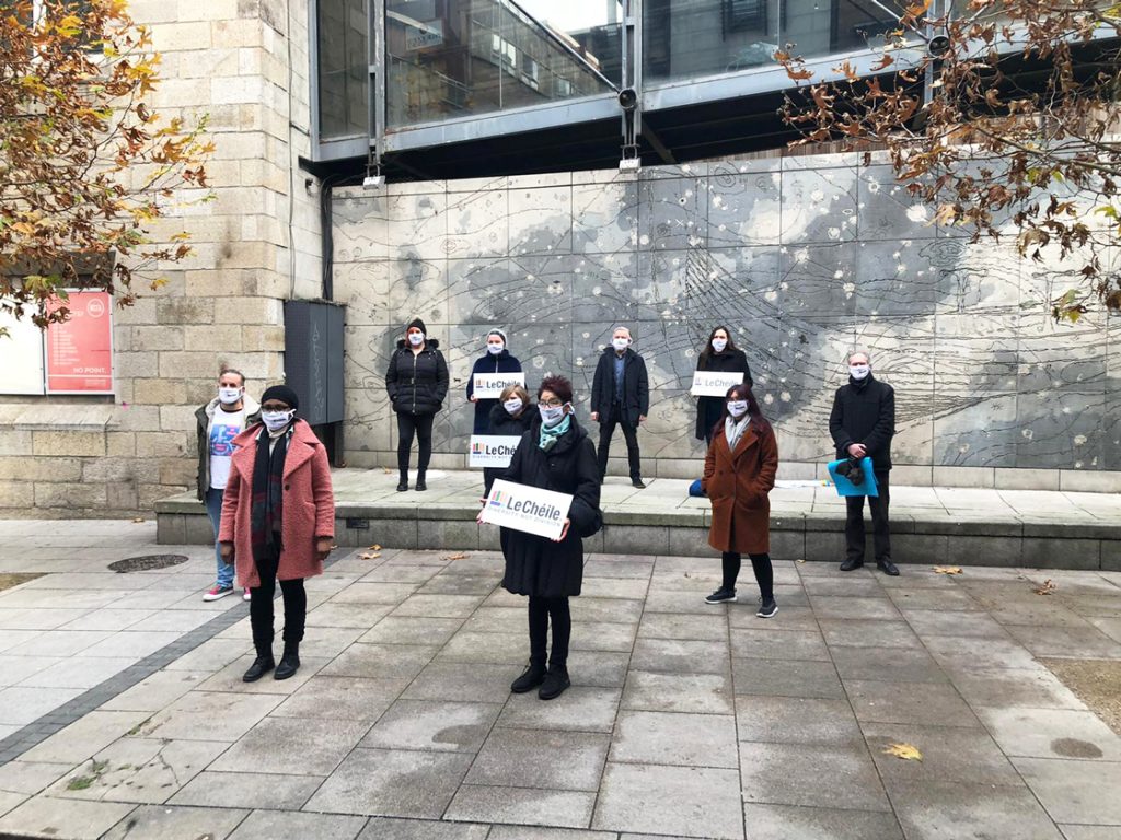 Members of Le Chéile alliance holding a banner that reads "diversity not division"