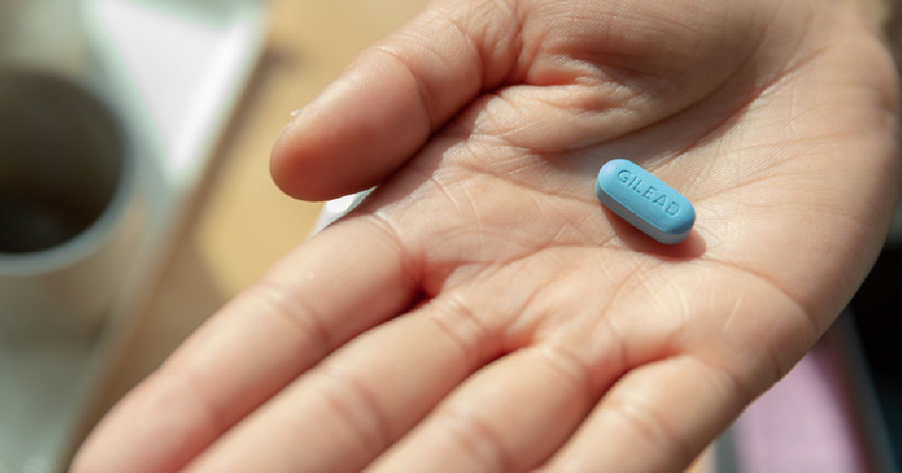 A hand holding a Truvada pill, which Gilead recently lose patent rights during an appeal case