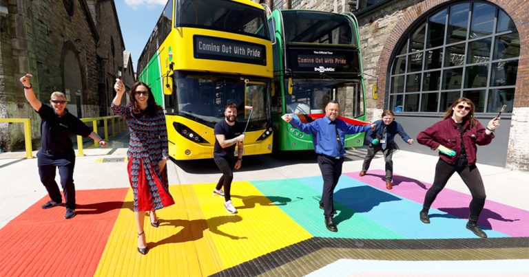 Dublin Bus & GCN press shot: members of Dublin Bus and GCN team pose standing on a rainbow crossing
