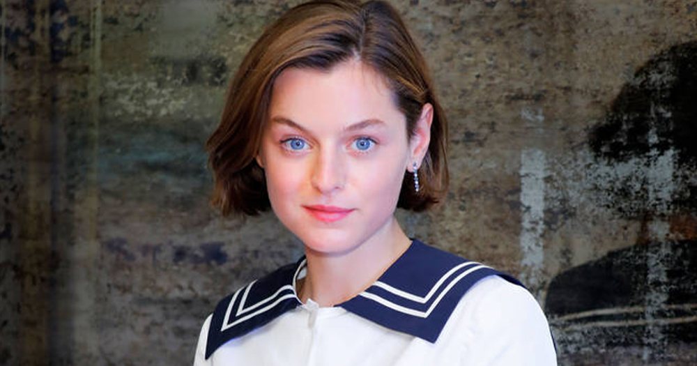 A young woman in a sailor shirt with chin length hair