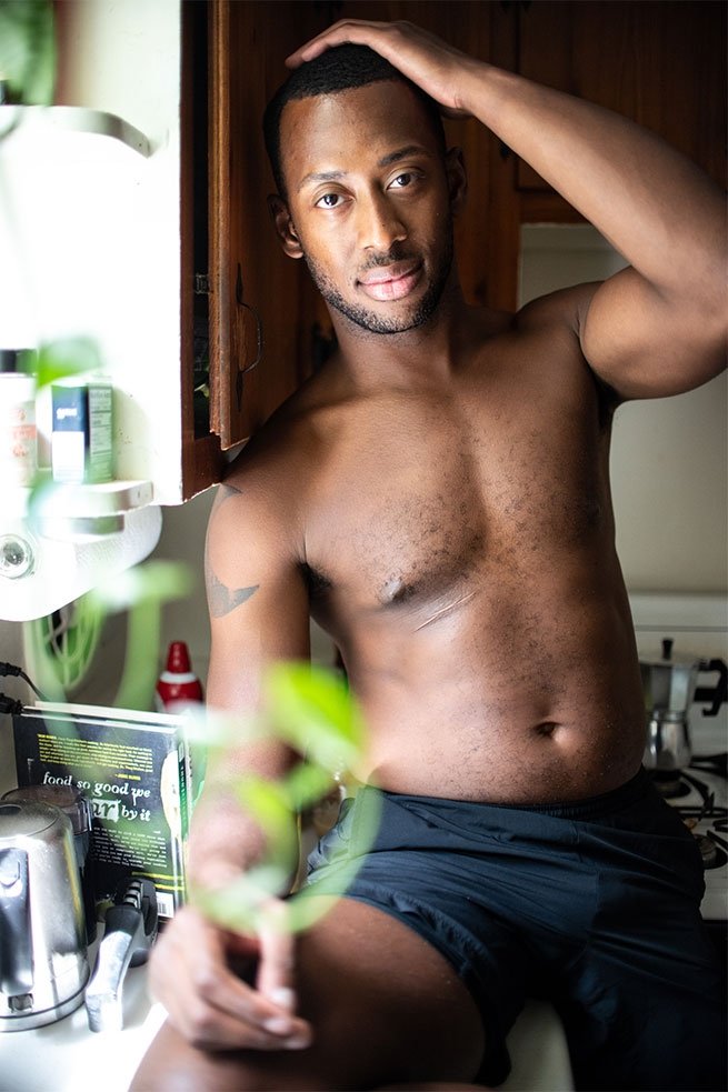 Portrait of a shirtless gay black man wearing short in the latest edition of Elska