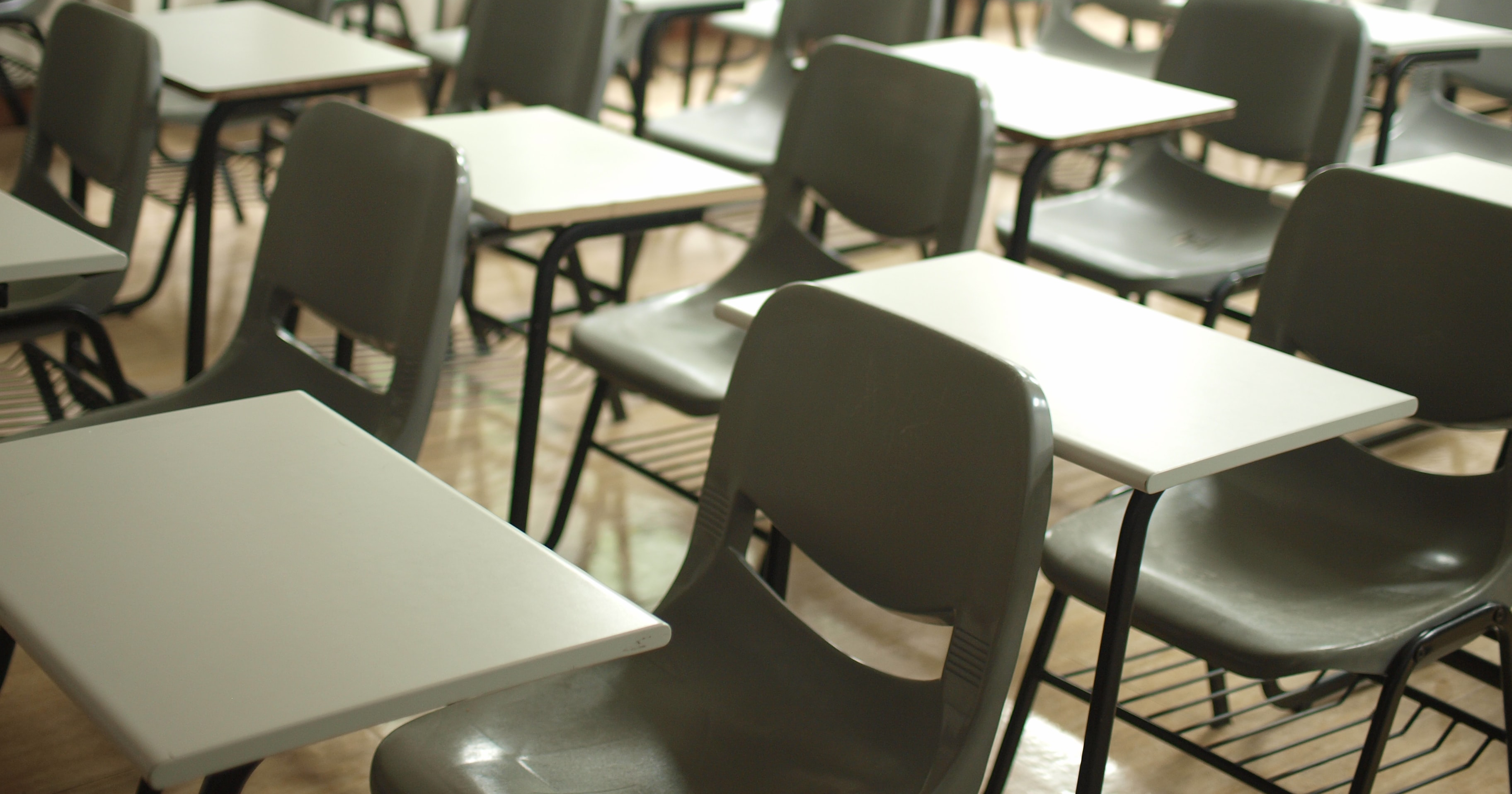 A classroom full of empty tables and chairs, as a homophobic RSE booklet has been removed from Irish schools.