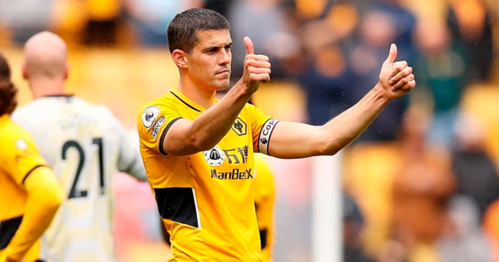 Conor Coady gives a thumbs up to Wolves fans after captaining the side in a match.