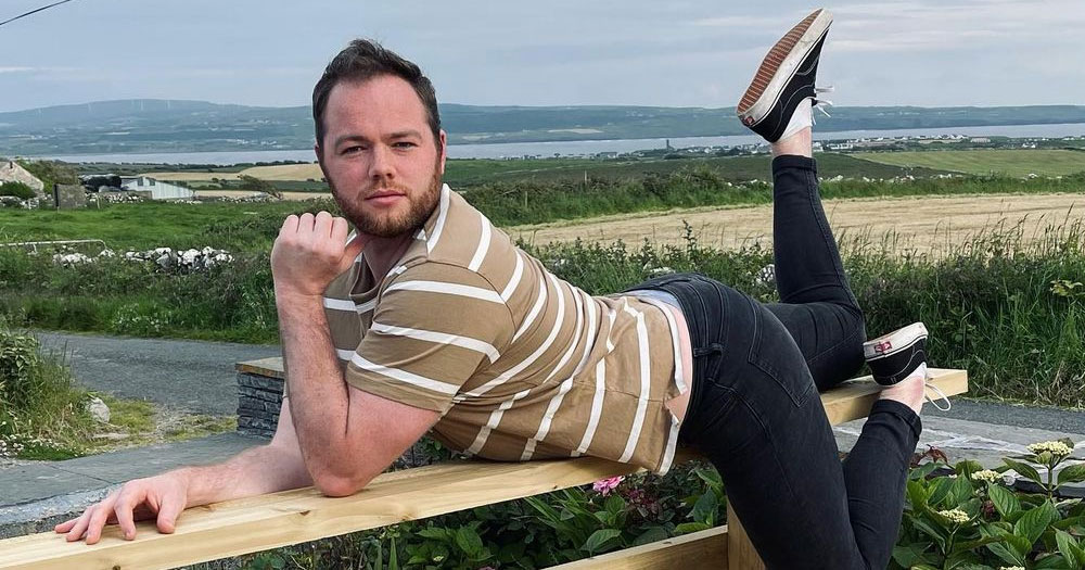 Cian Griffin posing on a fence post in rural Ireland