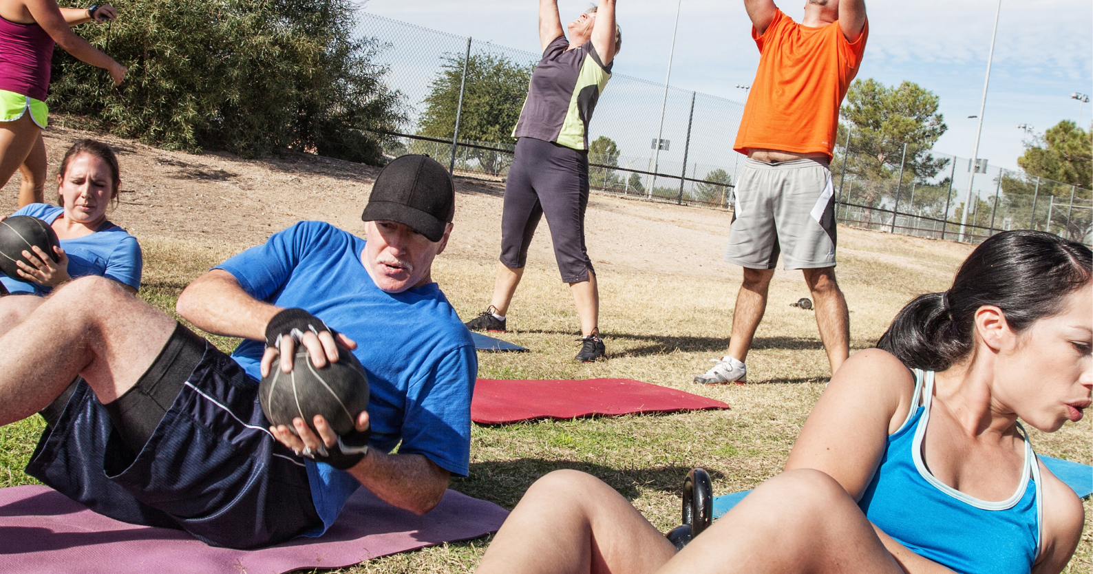 An image of an outdoor fitness class used to advertise the FlynnFit Bootcamp.