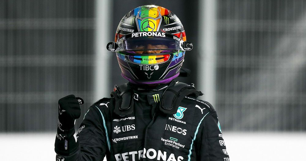 Lewis Hamilton celebrates in his Pride helmet after winning the Saudi Arabian Grand Prix.