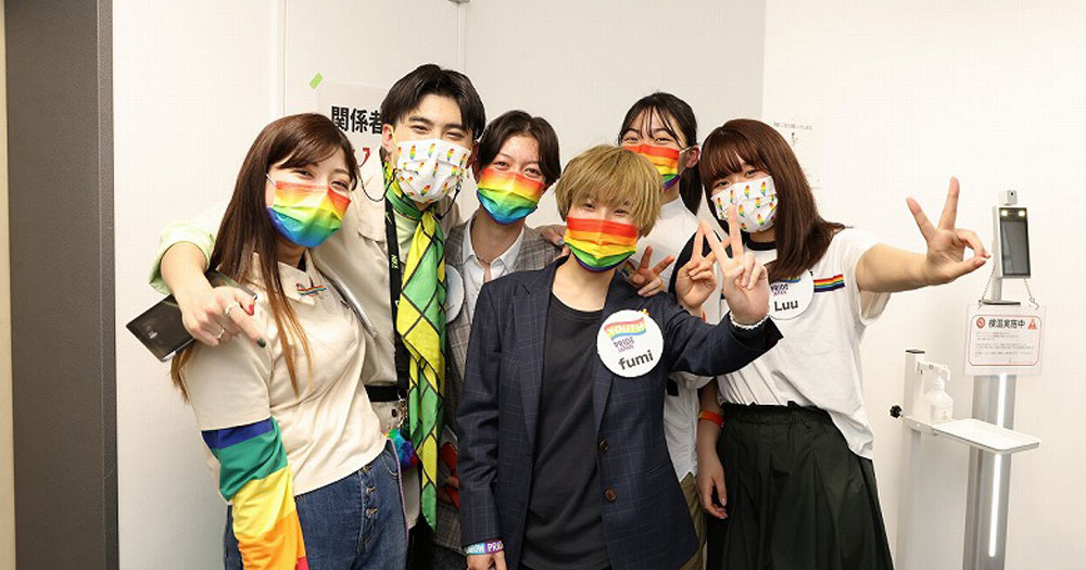 A group of friends celebrating Pride in Tokyo