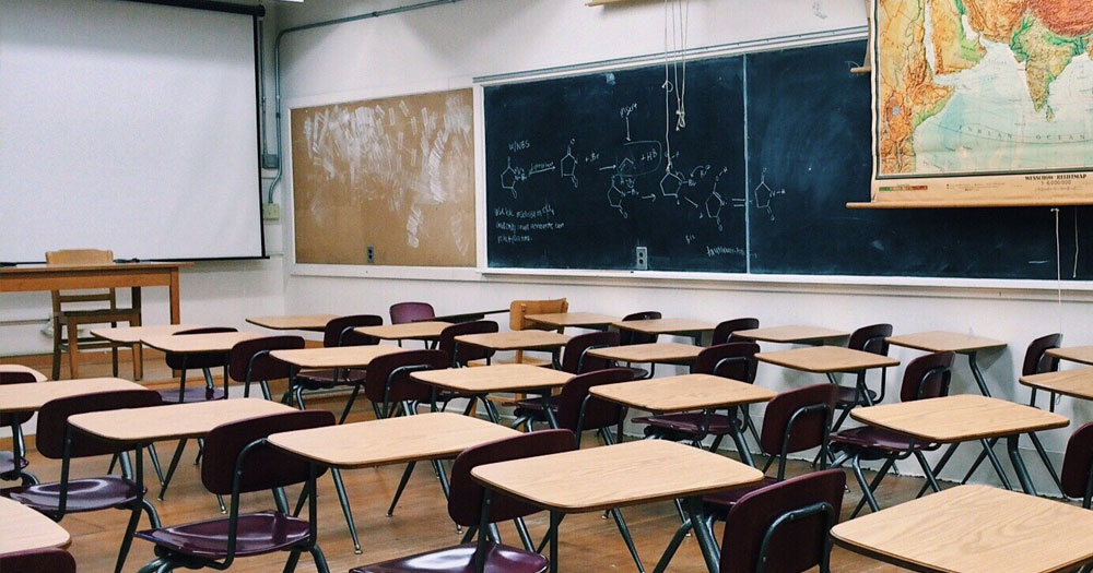 Empty school classroom. This story discusses the Florida "Don't Say Gay" bill