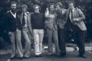 Black and white photograph of six men from the mid 1970s.