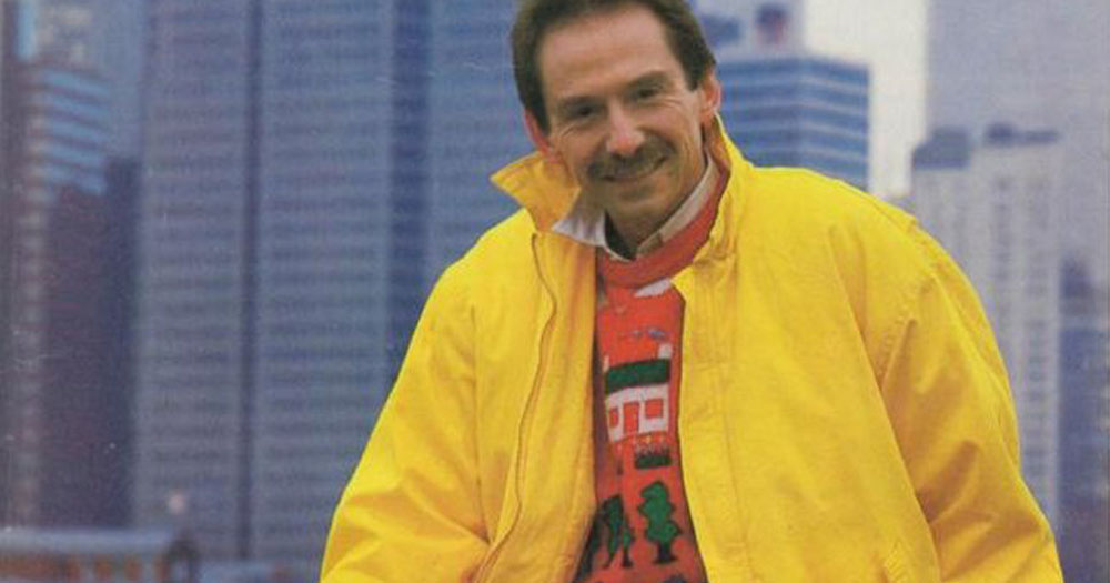 A new documentary is to air about the life of Vincent Hanley. The photograph features Vincent wearing a bright yellow jacket with a red jumper in front a New York skyline.