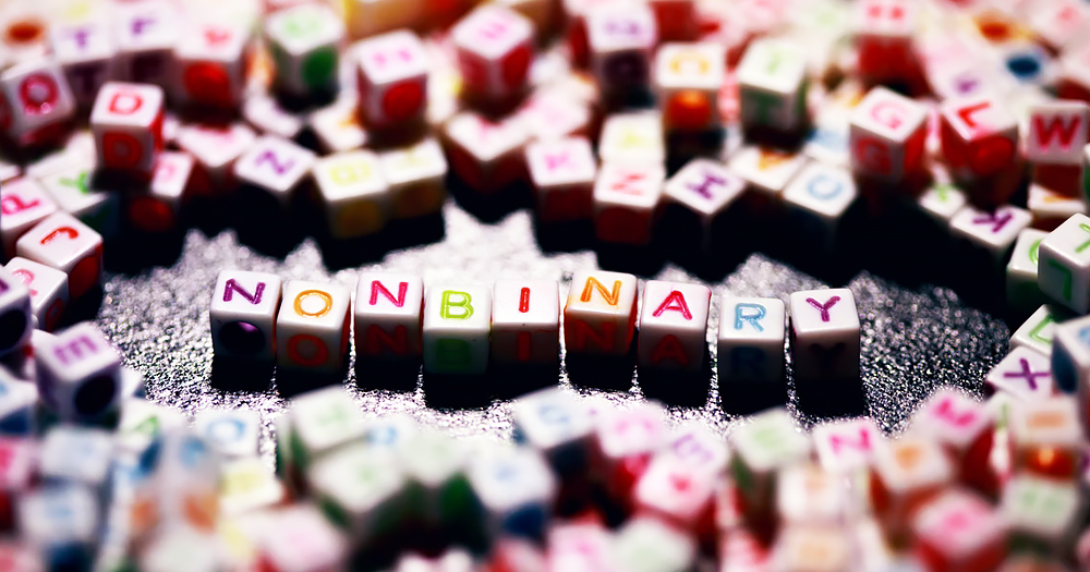 The word non-binary spelled with toy cubes, as Italy legally recognises such gender identity for the first time.