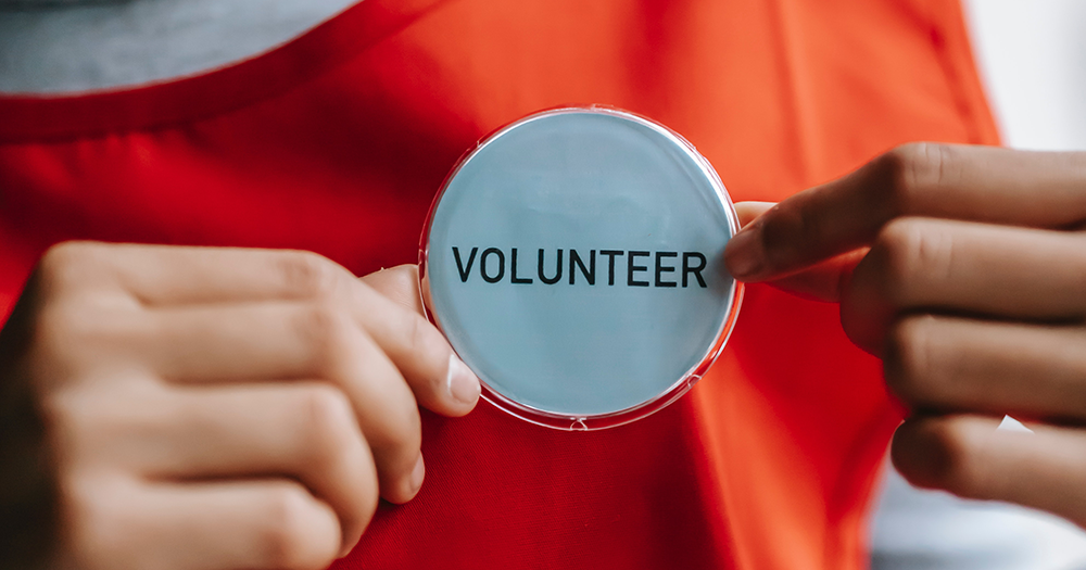 A close up of a Volunteer badge as See Change seeks mental health volunteers.