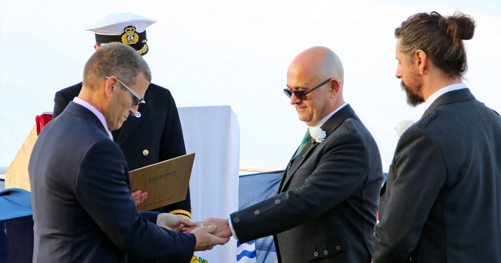 A photo of the wedding between Eric Bourne and Stephen Carpenter, the first same-sex marriage in the British Antarctic Territory