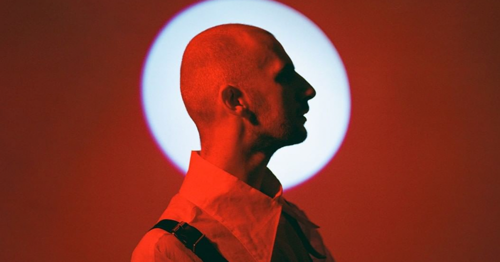 St. Bishop in red light on the over of his new EP.