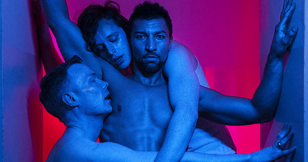 Poster for new chemsex play 'Party Scene: Chemsex, Community and Crisis' by ThisIsPopBaby, showing three men huggin each other provocatively.
