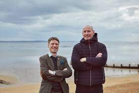 Ed Rogers and Gareth Thomas pose together during Ford Tough Talks. 