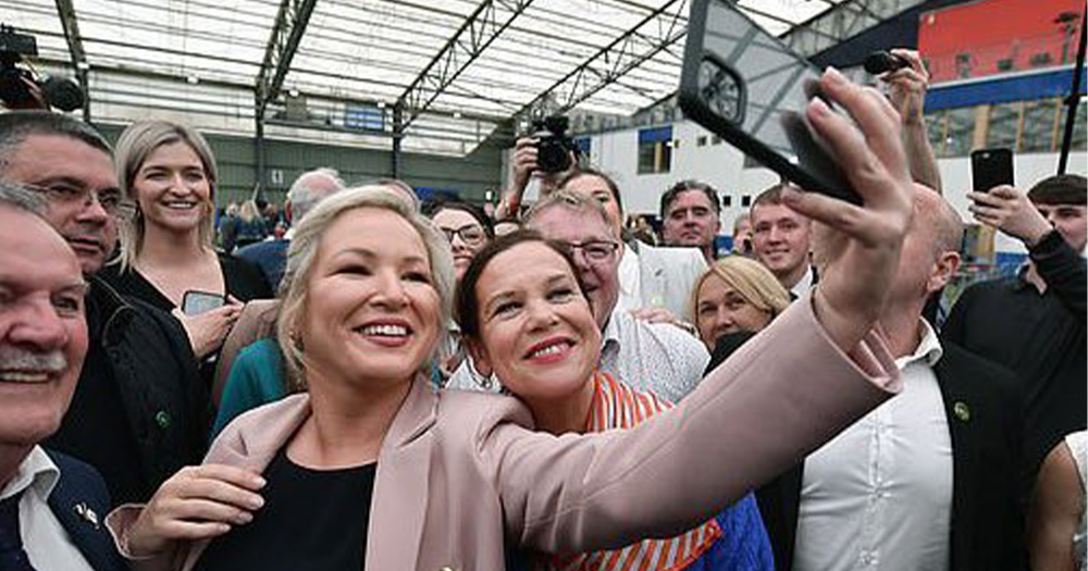 Michelle O'Neill takes a selfie with a group of politicians and supports following the Sinn Féin win in Northern Ireland