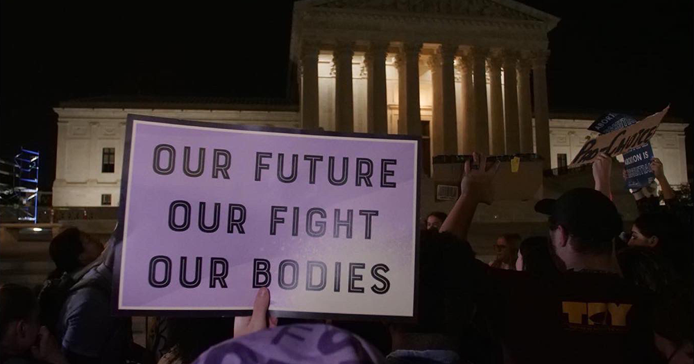 A sign reading 'OUR FUTURE OUR FIGHT OUR BODIES' held at Supreme Court Roe v Wade protest.
