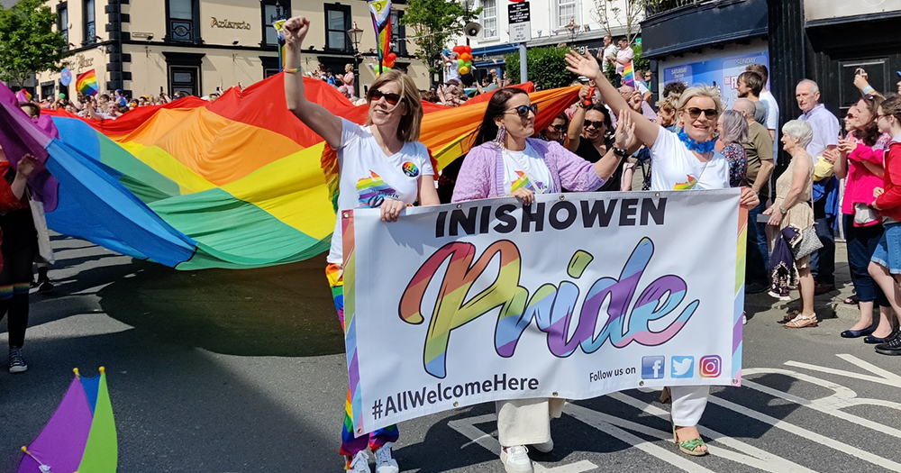 Marchers hold Inishowen Pride banner at Donegal parade.