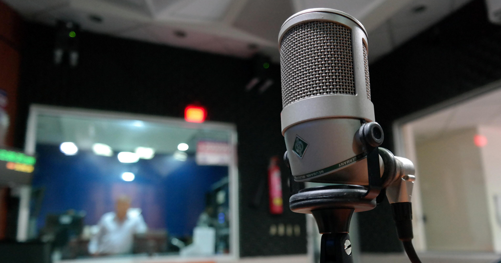 A close up of a microphone in a recording studio
