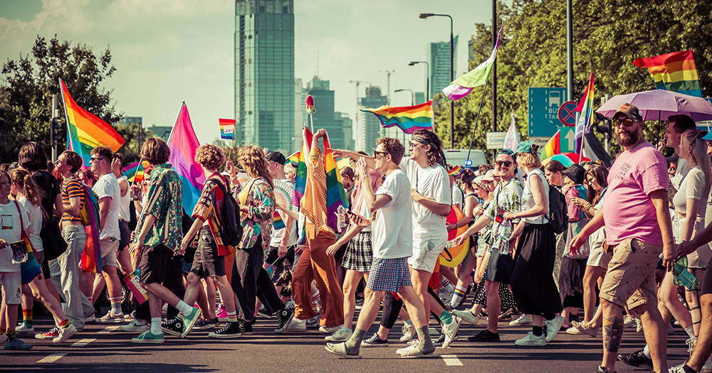 Marchers at Warsaw Pride as Amnesty International releases a new report on Poland.