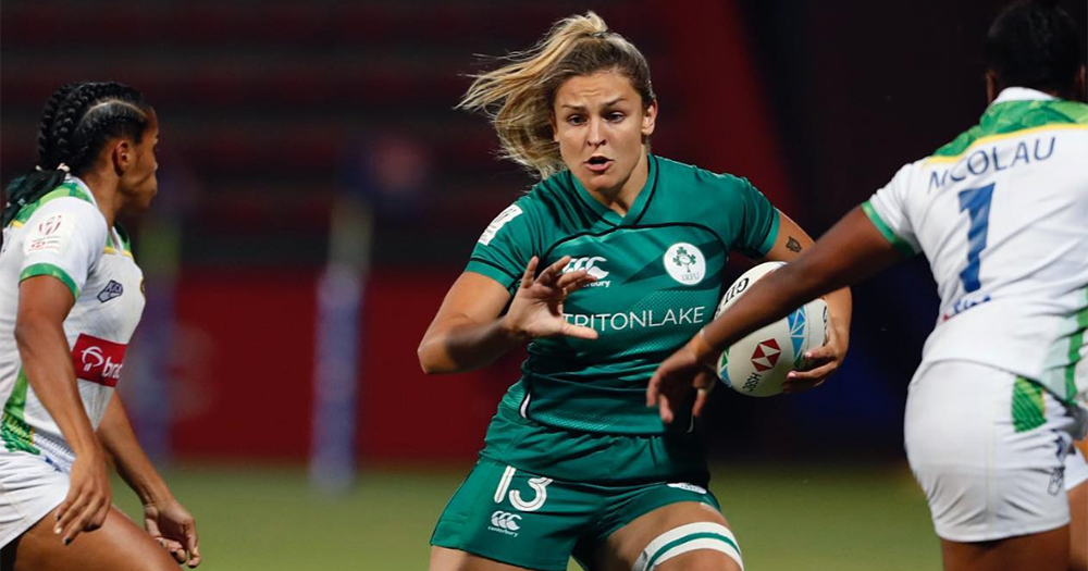 IRFU women's rugby player in action.