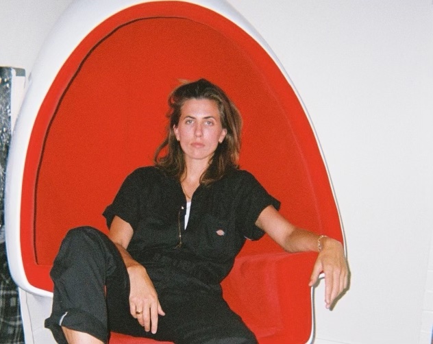 An image of E.R Fightmaster sitting in an egg chair.